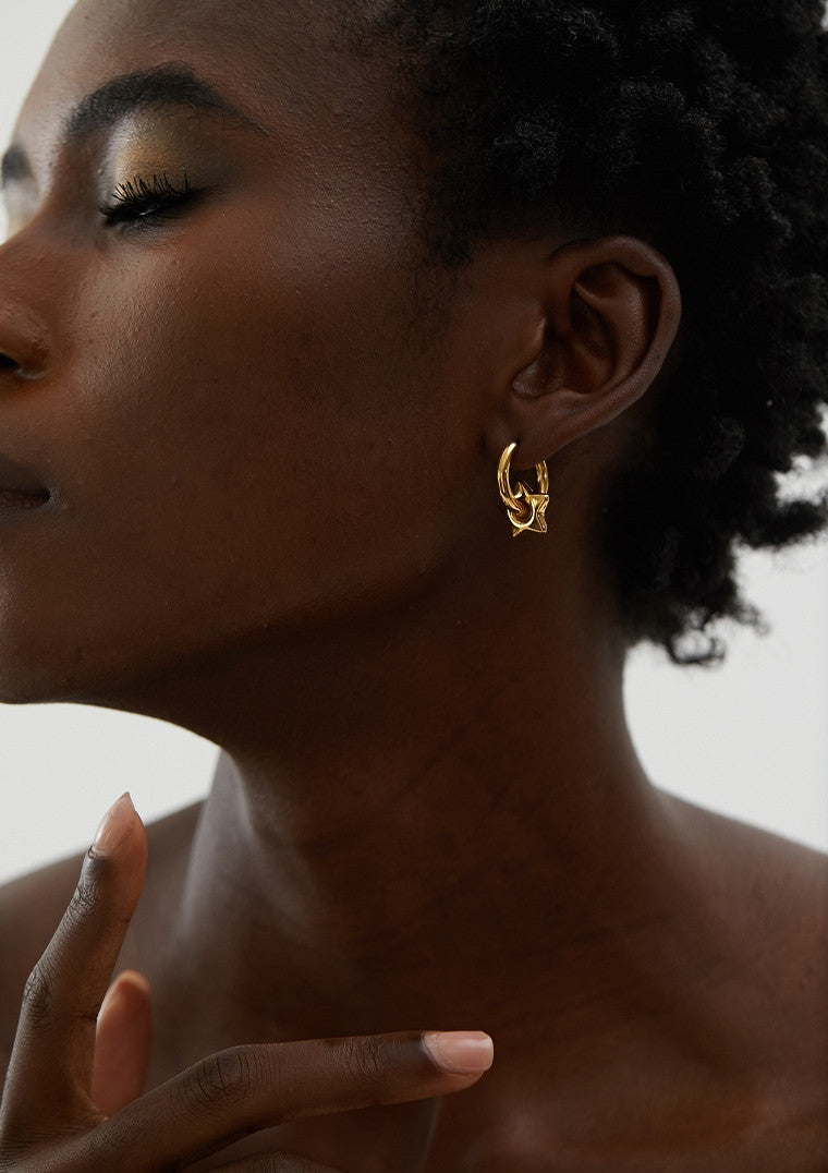 Boucles d’oreilles pendantes étoiles en acier inoxydable