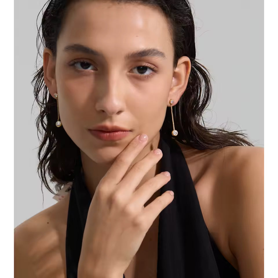 Boucles d'oreilles pendantes Lueur en acier inoxydable