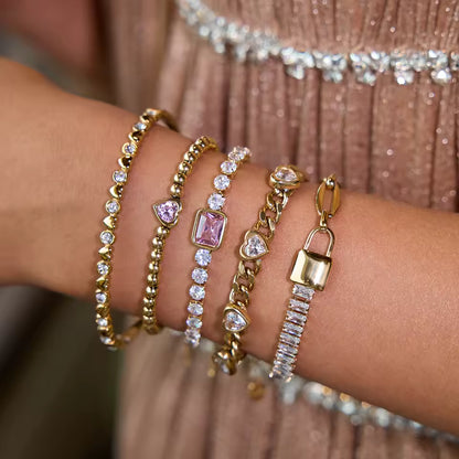 Bracelet Alma en acier inoxydable doré avec cœur rose