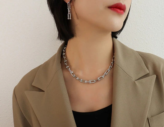 Collier trèfle noir double face