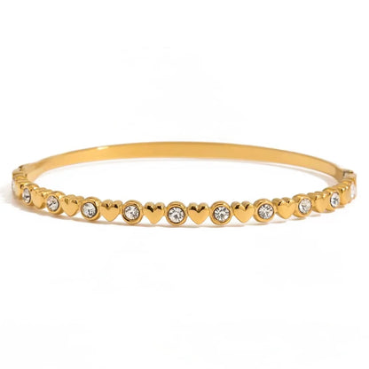Bracelet Céleste doré en acier inoxydable avec cœurs et zircons
