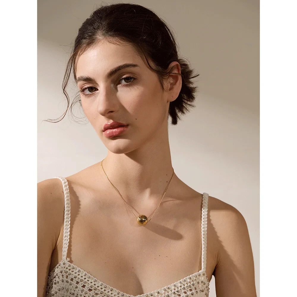Collier Boule — en acier inoxydable doré