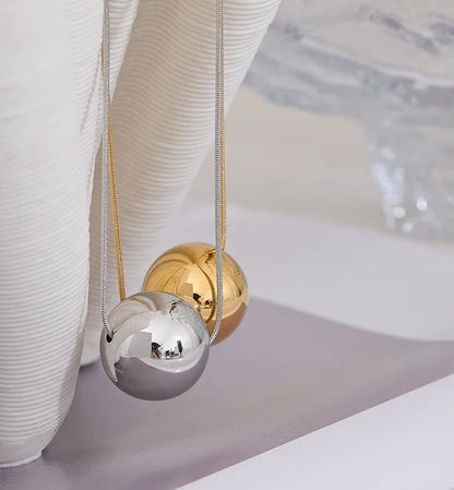 Collier Boule — en acier inoxydable doré