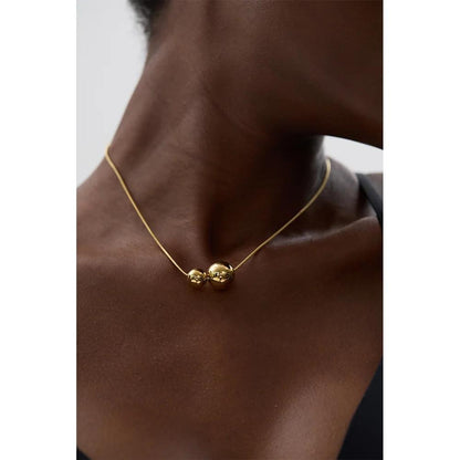 Collier Sphères en acier inoxydable doré