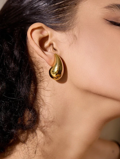 Boucles d’oreilles Goutte sculpturale en acier inoxydable doré