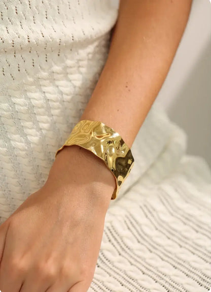 Bracelet manchette Illusion en acier inoxydable doré