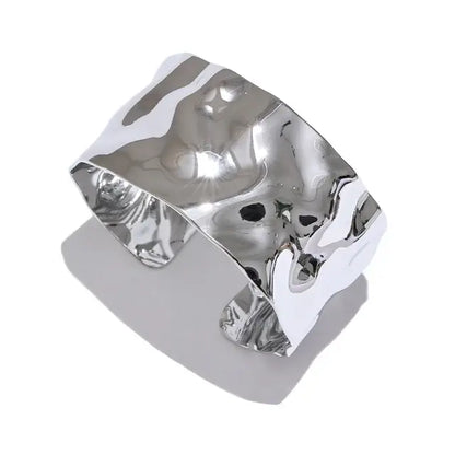Bracelet manchette Illusion en acier inoxydable doré