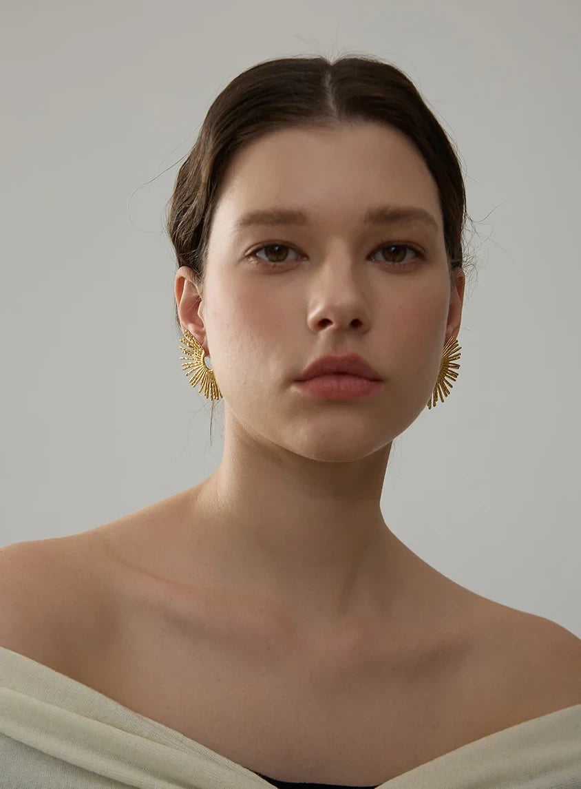 Boucles d’oreilles pendantes rayons en acier inoxydable