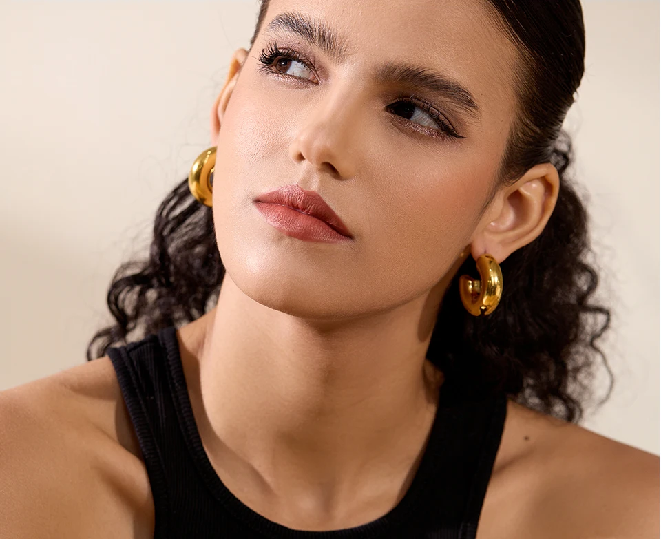 Boucles d’oreilles bombées dorées en acier inoxydable