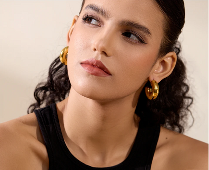 Boucles d’oreilles bombées dorées en acier inoxydable