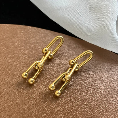 Boucles d’oreilles ores en acier inoxydable iconique