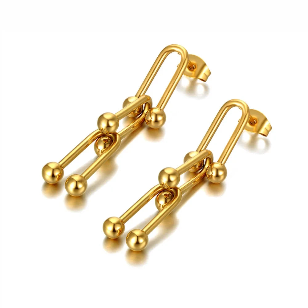 Boucles d’oreilles dorées en acier inoxydable iconique