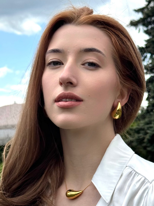 Boucles d’oreilles Goutte sculpturale en acier inoxydable doré