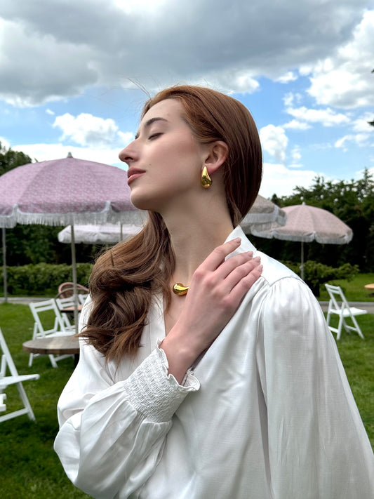 Boucles d’oreilles Goutte sculpturale en acier inoxydable doré
