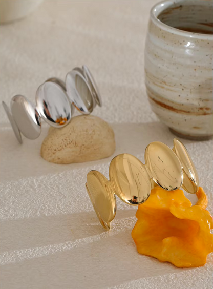 Bracelet manchette Aura en acier inoxydable doré