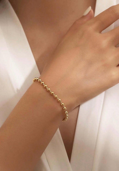 Bracelet Sphères dorées en acier inoxydable doré